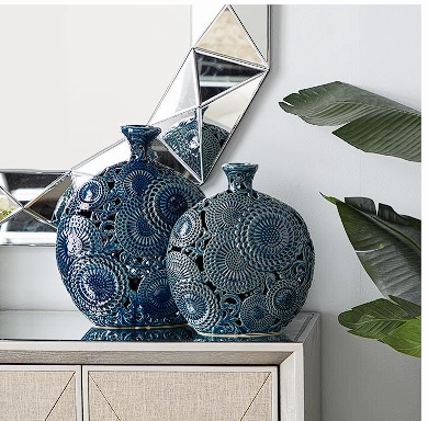 BLUE CERAMIC FLORAL VASE WITH CUT OUT PATTERNS,