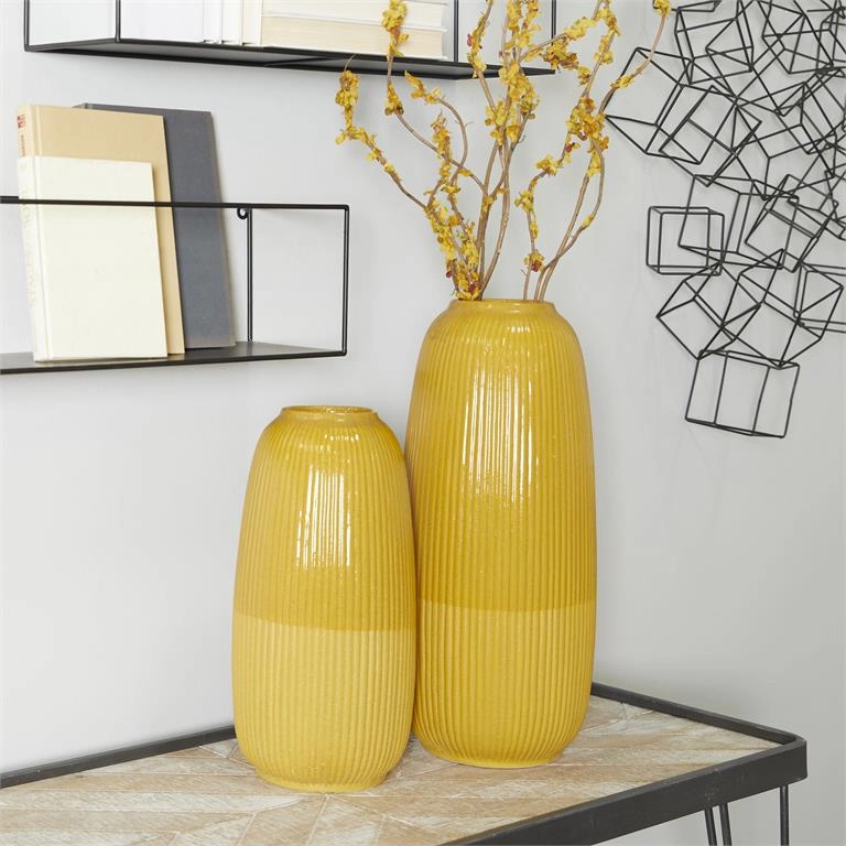 COSMOLIVING BY COSMOPOLITAN YELLOW CERAMIC VASE