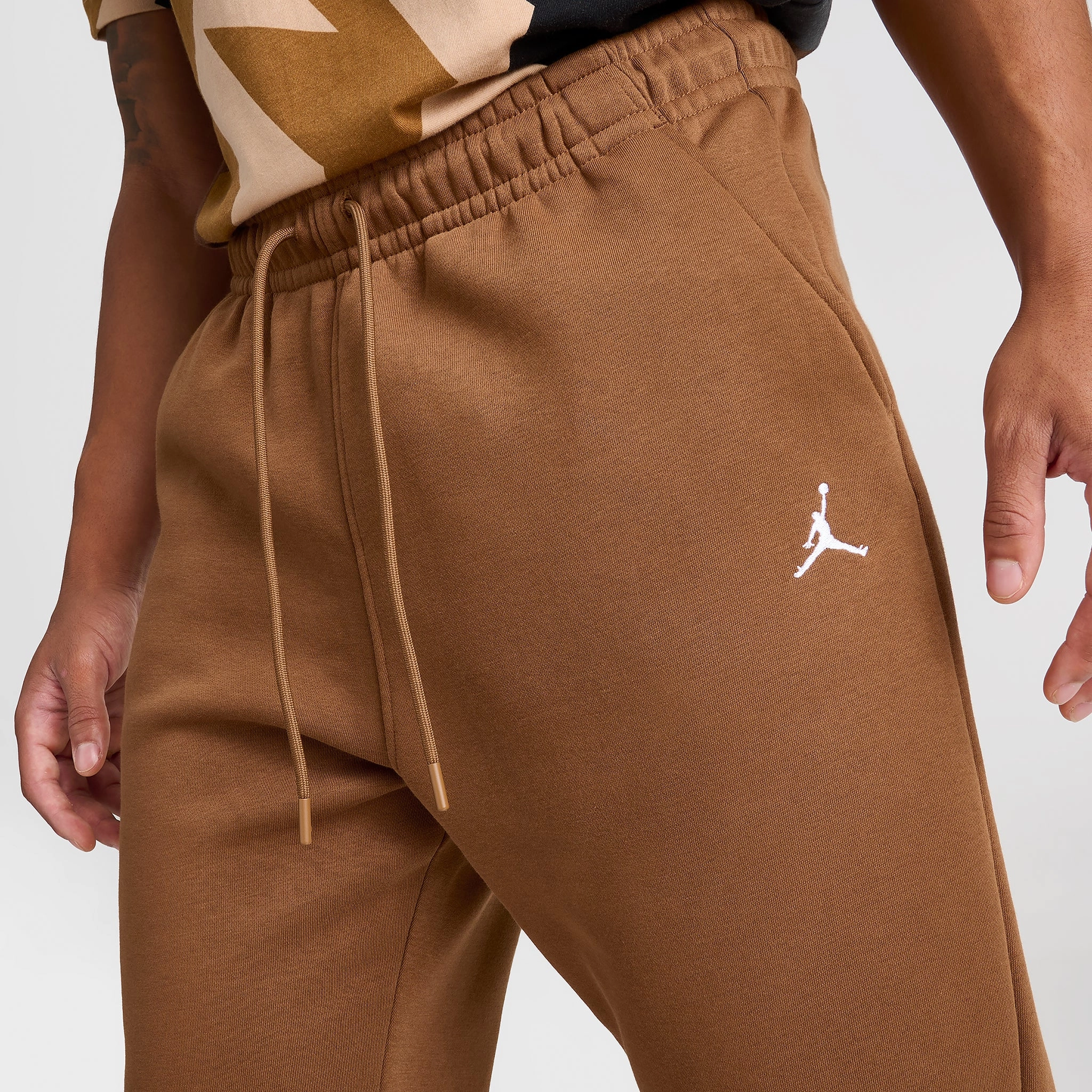 Jordan Essentials Fleece Pants Light British Tan / White